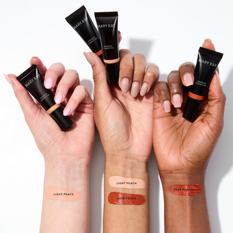 Swipes of light peach, and deep peach Mary Kay&reg; Undereye corrector are seen on wrists on light, medium, and deep skin tones.