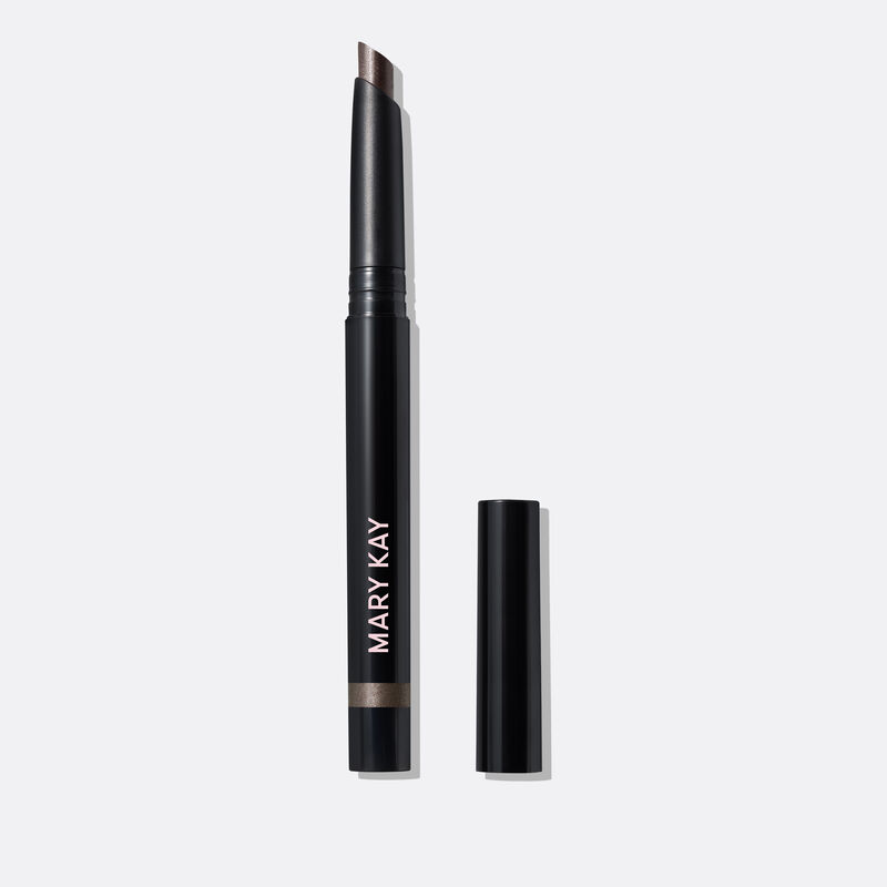 The Shimmer Eye Shadow Stick in shade Midnight Galaxy stands on a white background with the cap off, clearly showing the slanted tip and shade.