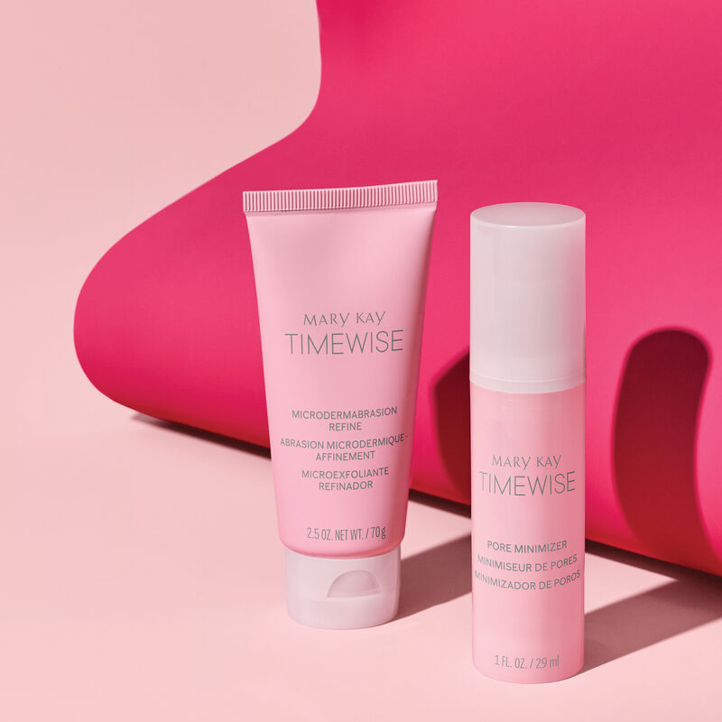 Mary May Microdermabrasion Refine and Pore Minimizer skin care products are photographed with a light pink and fuschia background.